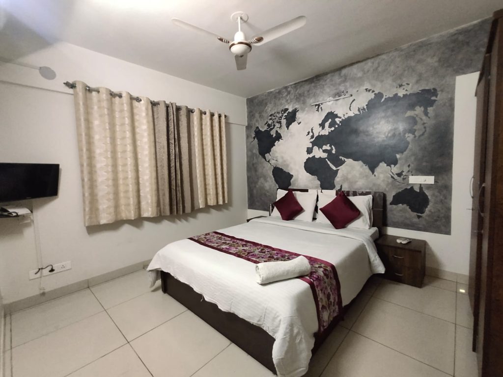 cozy service apartments in hinjewadi pune white bedoom